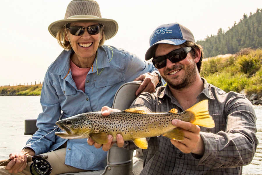 https://www.montanaanglingco.com/wp-content/uploads/Angler-Guide-Brown-Trout-Yellowstone-River.jpg